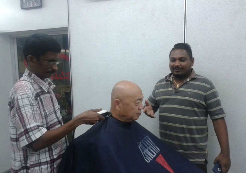 Kuala Terengganu barber offers free haircuts for the disabled