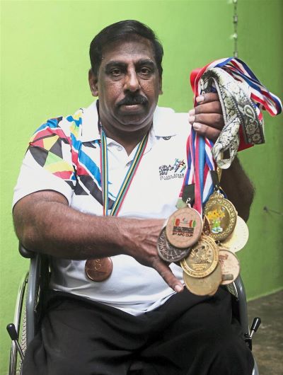 Disability takes a backseat for wheelchair-bound Mariappan