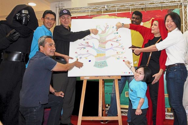 Artworks by the disabled turned into products and sold at charity carnival