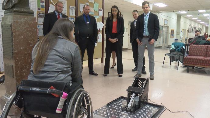 Virginia Tech team designs device to help change disabled veteran’s wheelchair wheels