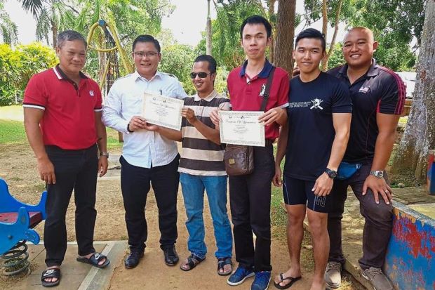 Swimming duo shows visual impairment no barrier to achieving goals