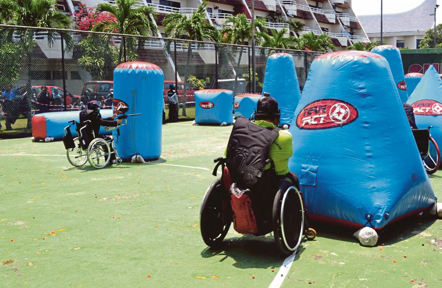 Paintball fun for disabled participant