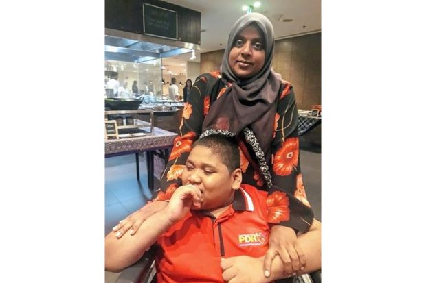 Buka puasa treat for the needy and the disabled