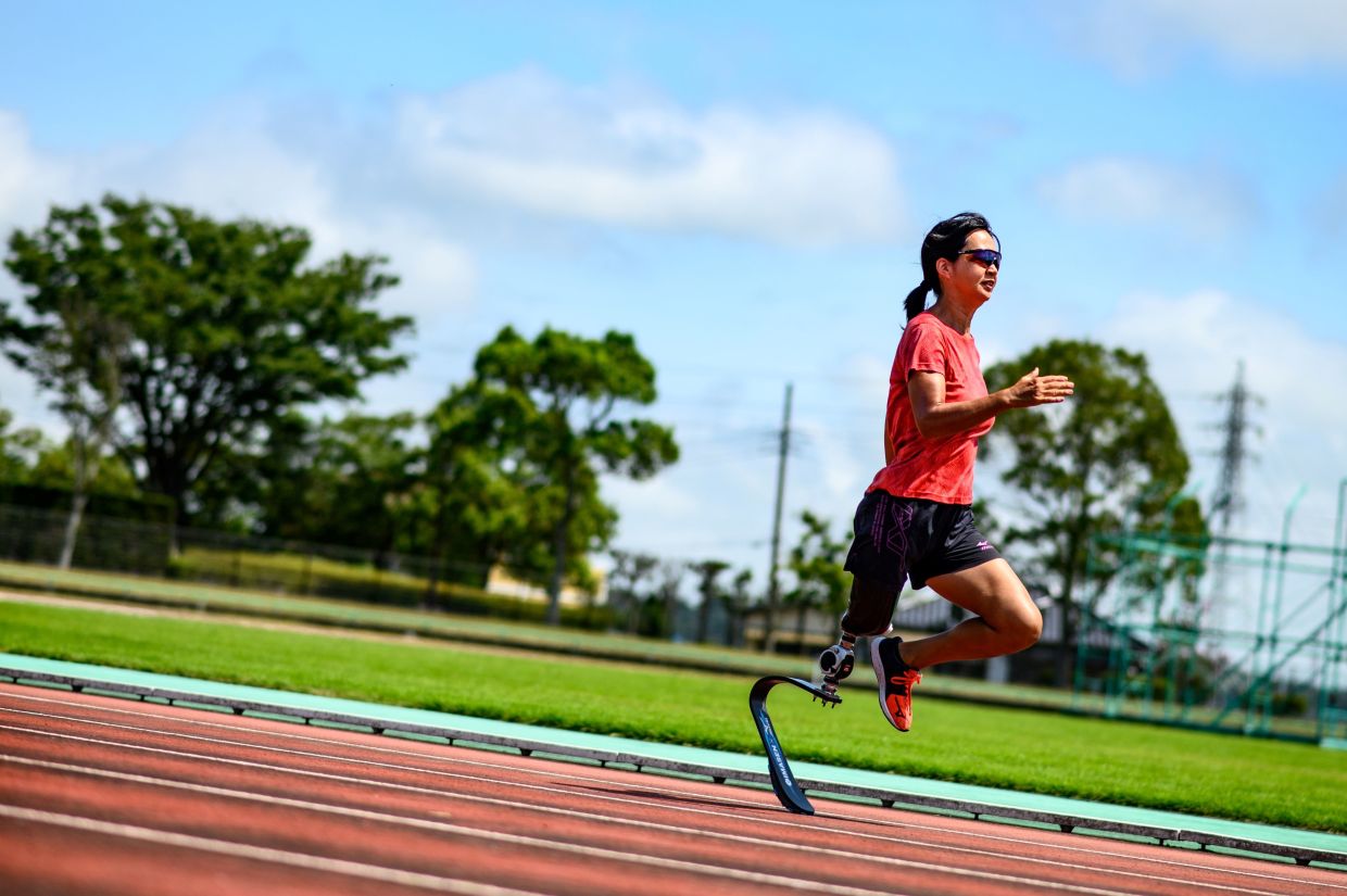 Japanese athlete Sayaka Murakami practicing with a running blade